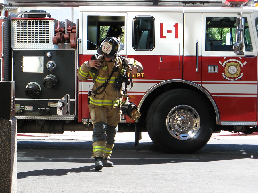Firefighters working a late shift during a stressful situation.